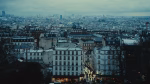 a view of a city from the top of a hill