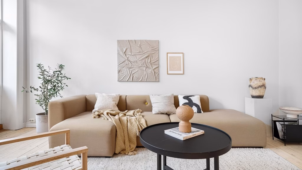 real estate, sofa, living room, table, interior, house, luxury, floor, wooden, chair, decor, pillow, cabinet, view, window, art, design, hallway, lamp, carpet, home