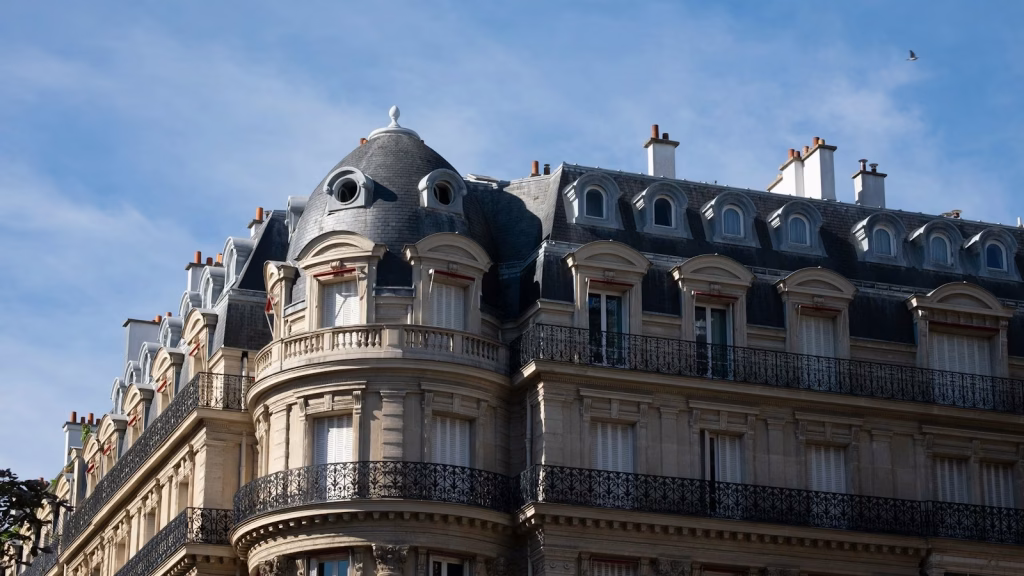a tall building with a clock on the top of it