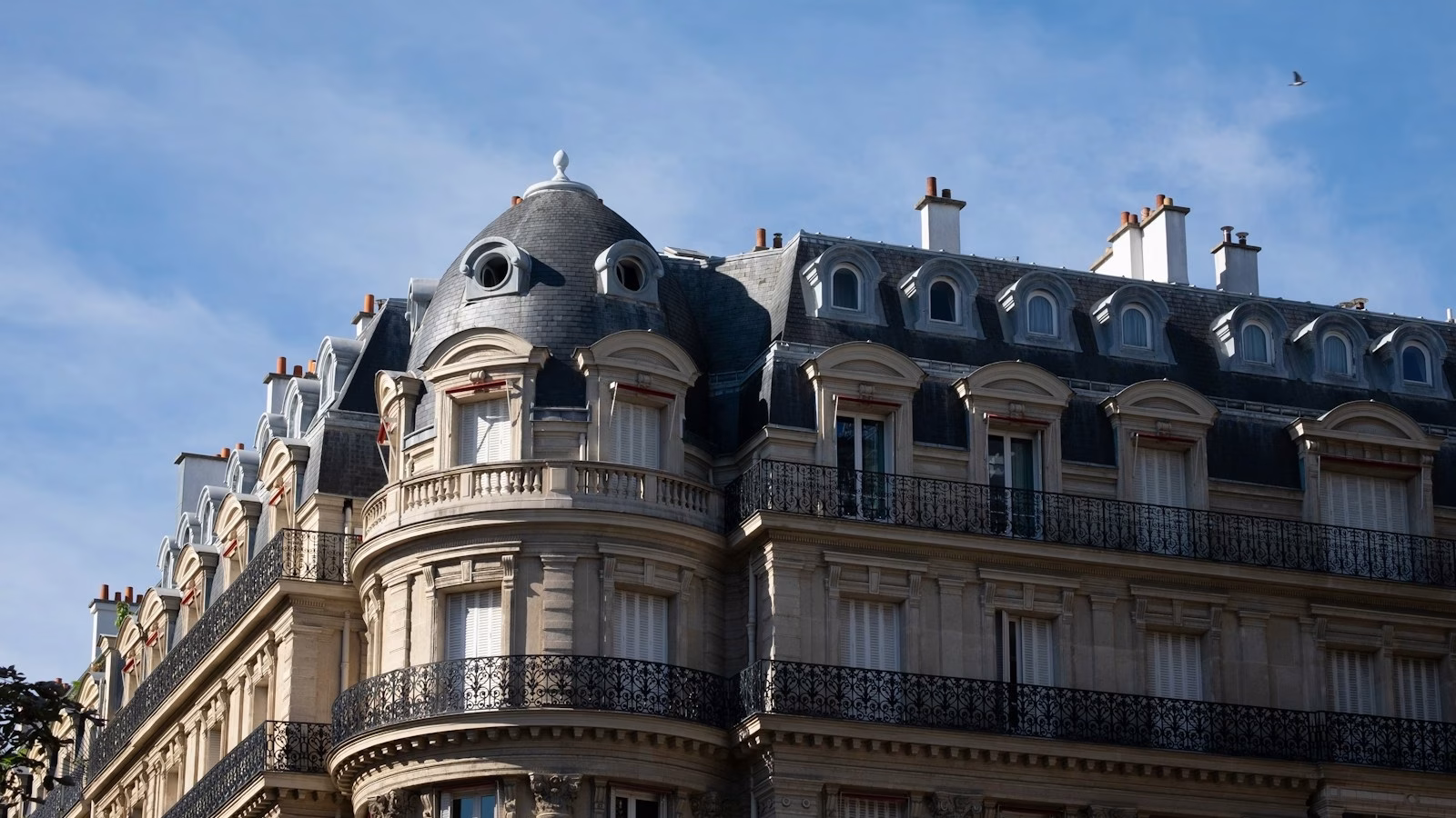 a tall building with a clock on the top of it