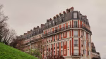 Charming residential building in Paris showcasing classic architectural style.